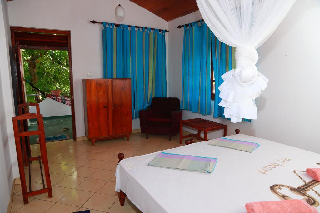 Panorama Rock Cafe Bed & Breakfast Тангале Стая снимка